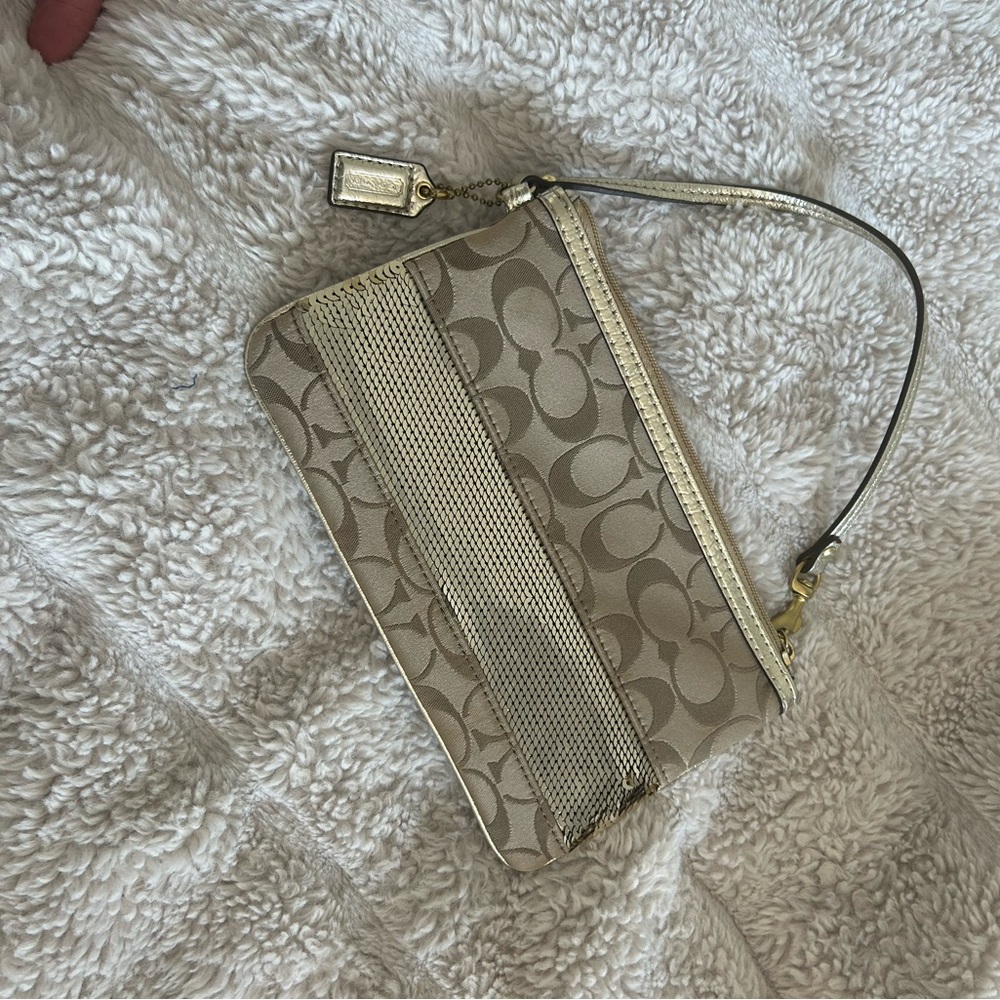 Coach Signature Canvas Wristlet in Gold Sequence